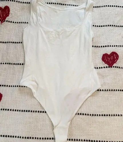 Lululemon Chic White  Bodysuit size small thumbnail 1