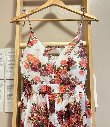 White Romper with a Long Train, Red Flower Prints, and Zipper in the Back Size M