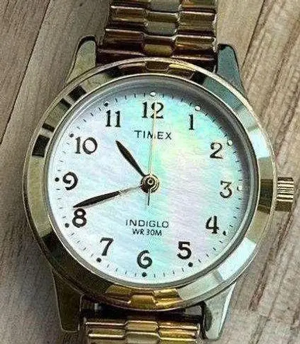 Timex Ladies Watch Indiglo Pearlescent Dial Gold Tone Stretch Band WR30M