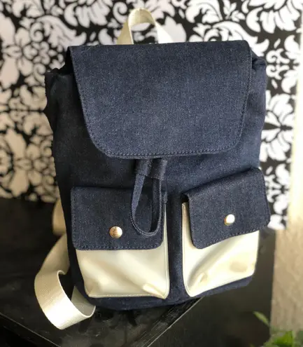 Mini Blue denim bag pack backpack white straps drawstrings and front pockets