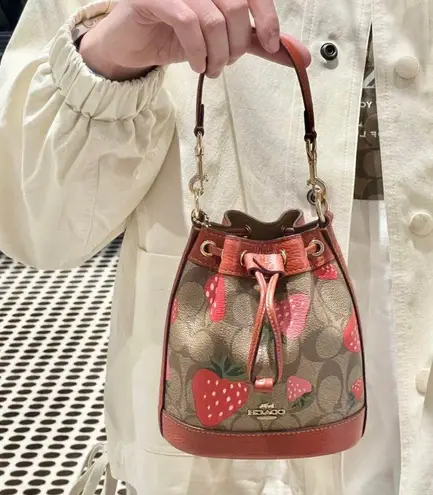 Coach  Mini Dempsey Bucket Bag In Signature Canvas With Wild Strawberry CH164