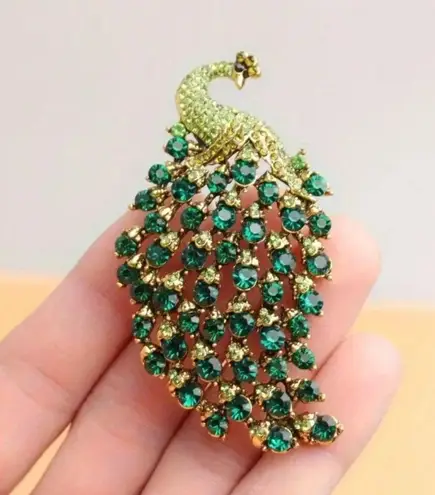 Elegant Green and Gold Peacock Brooch