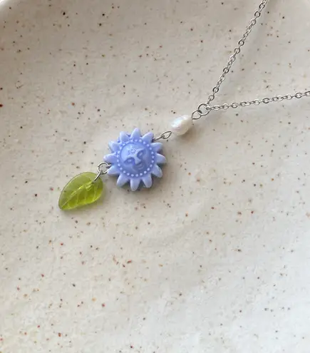 Handmade unique funky cute light blue ceramic sun & Czech glass leaf & freshwater pearl necklace☀️🌿