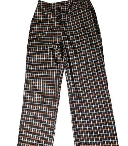 Full Tilt  cute fall look black slacks with orangish tan and white plaid.