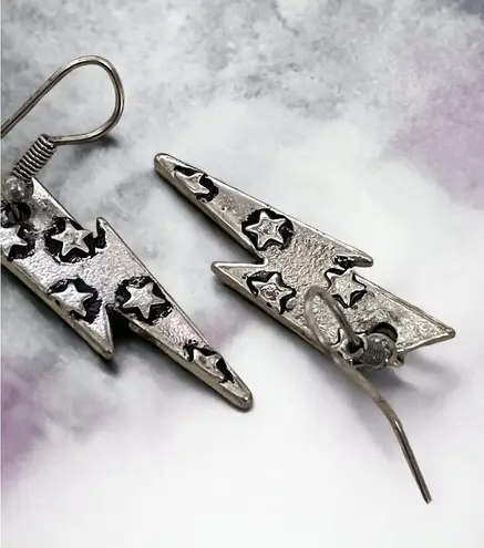 Trendy and Lightweight Silver Lightning Bolt Earrings with Star Accents