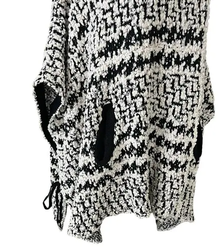 Solitaire by Ravi Khosla black and white boucle knit cape sweater