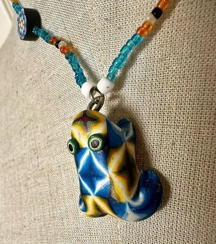 Beaded blue frog pendant necklace