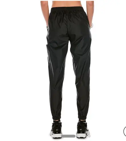 Nike Women's Sportswear Repel Essential Woven Jogger Pants