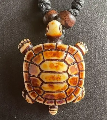 Adjustable black rope turtle necklace
