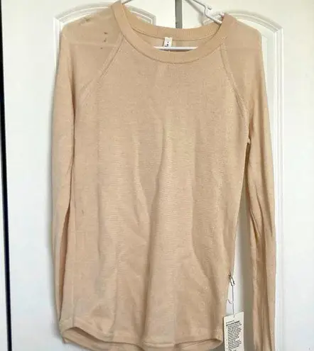 Lululemon  nwt sit in lotus sweater sz 8 small holes on right shoulder