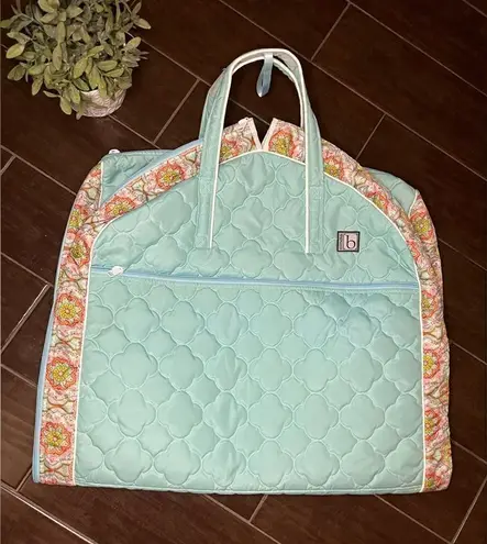 Cinda B garment bag that grows Green