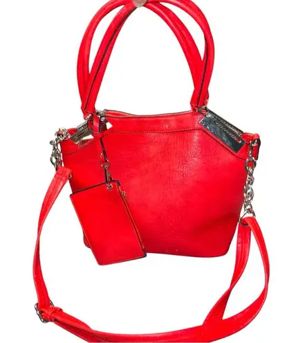 Black Rivet red bag with silver hardware and lots of storage spaces for you.