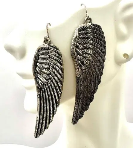 Silver tone angel wing earrings