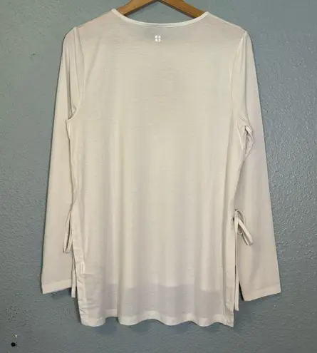 Sweaty Betty NWT  Tie Side Yoga Long Sleeve Top Lily White