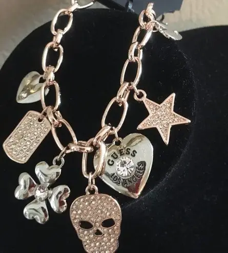 Guess  Skull Hearts Star Clover Charm Bracelet