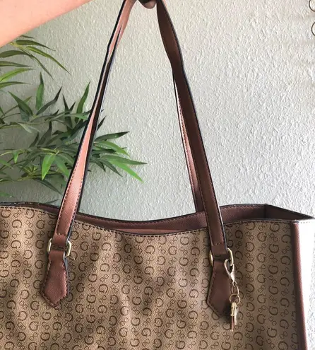 GUESS brown and tan tote monogram hand shoulder bag purse. Some wear as pictured. Great for work school college university. Can fit most books laptops. - Image 3