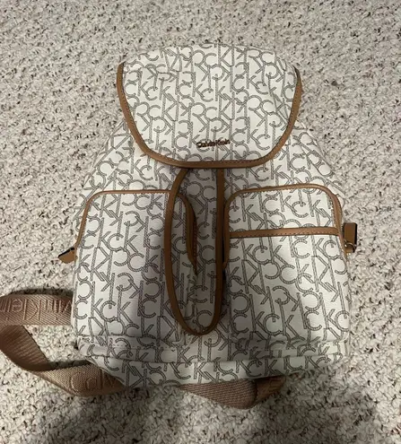 Calvin Klein brown and white backpack