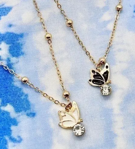Set of Black and White Rhinestone Butterfly Necklaces Gold
