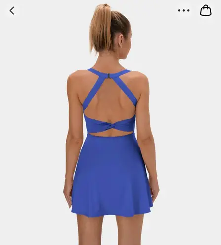 Halara NWT  Backless Twisted Active Dress-Easy Peezy Edition in Aster Blue -M  Brand new with tags. The viral athleisure dress that is cute, comfy and versatile! Size medium, which best fits an 8-10. $60 retail.