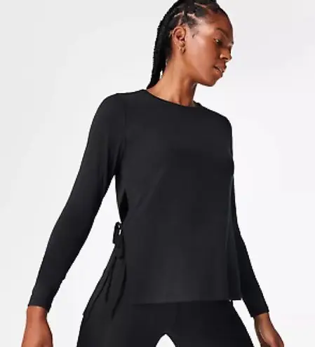 Sweaty Betty  | Tie Side Yoga Long Sleeve Top in black size 4-6