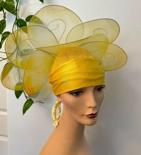 Handmade yellow floral hat. This hat was made for the stage in the theater.