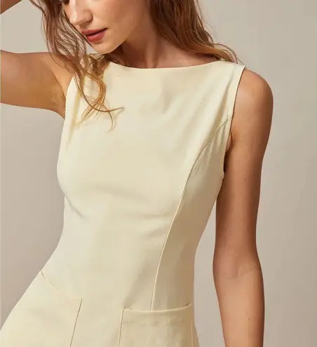 Rihoas Yellow Boat Neck Cutout Mini Dress