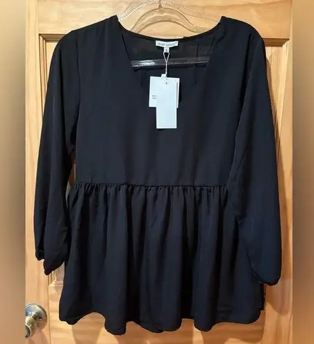 Mary Square V neckline and a gathered, peplum