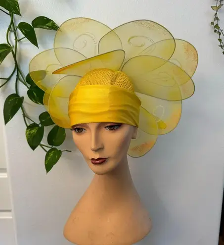Handmade yellow floral hat. This hat was made for the stage in the theater.