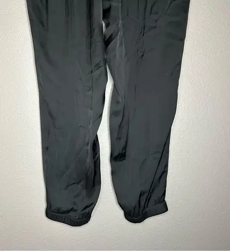The Kooples SPORT black satin joggers with zippered pockets size medium
