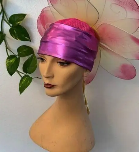 Handmade pink floral hat. This hat was made for the stage in the theater.