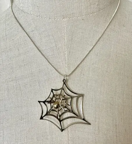 Two tone spider web pendant necklace Silver