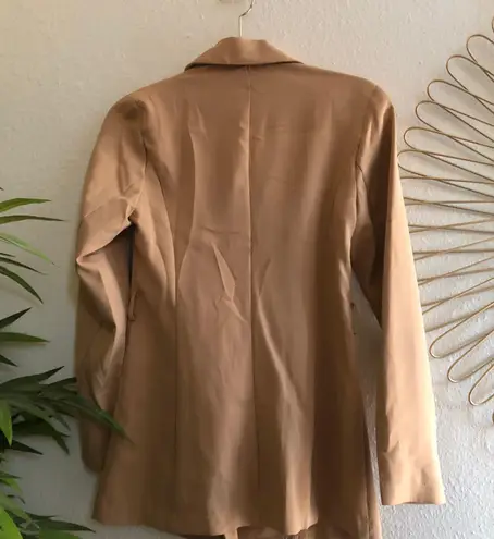 Slightly oversized beige tan double breasted long sleeve professional blazer