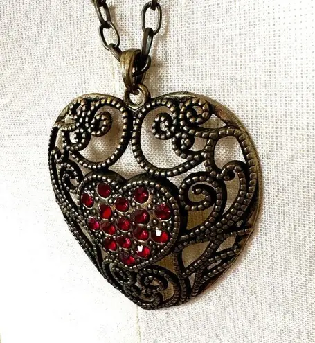 Brass tone red rhinestone heart pendant necklace