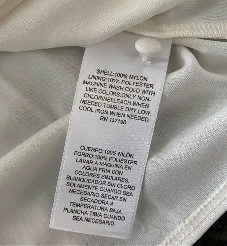 We Wore What Danielle Bernstein Puff Sleeve sheer dress