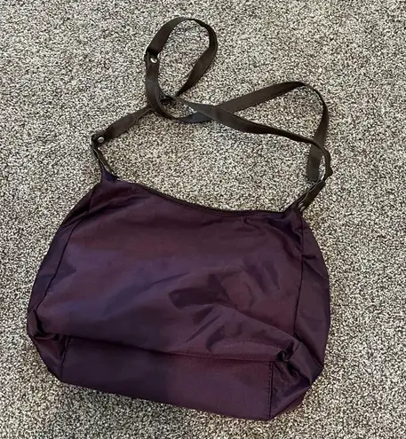 Chic Purple Crossbody Bag with Versatile Design
