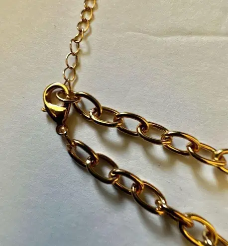 C 1946 gold tone long leopard black necklace