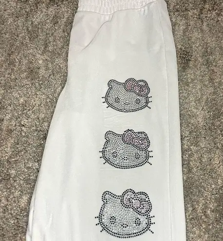 Forever 21  Rhinestone Hello
Kitty Zip-Up
Jacket With
Matching Sweatpants