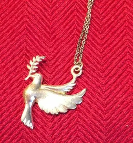 Bird gold colored charm