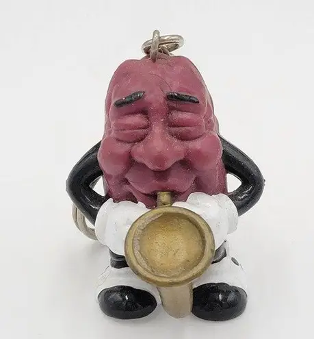 California 1987 Vintage Raisin Saxophone Player Keychain