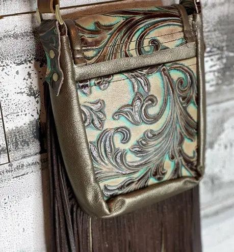 Hide Junky Metallic bronze and accents in turquoise and brown embossed crossbody purse