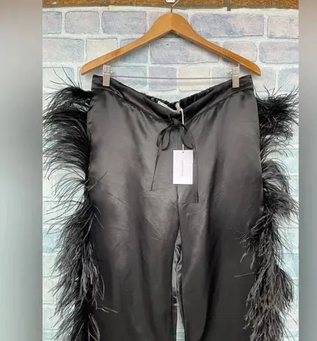 MARQUES' ALMEIDA
Feather