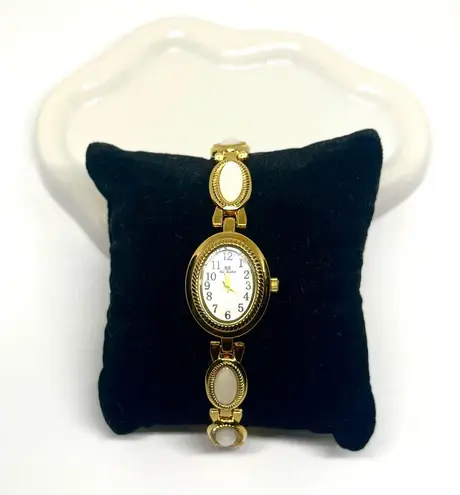 Gold plated dainty vintage style white stone watch