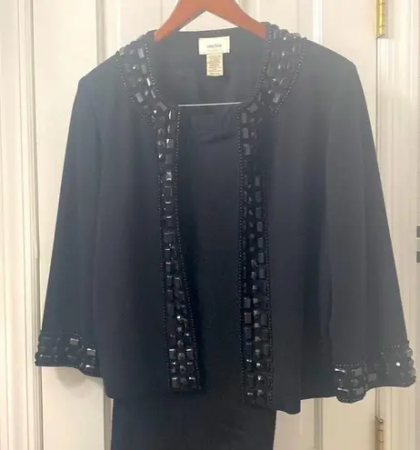 Neiman Marcus black beaded Jacket and Pant suit. Size Medium.