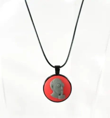 Unisex Punk Pendant on Black Toned Metal with Black Waxed Cord Red