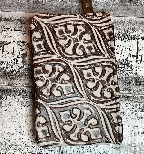 Small Leather wristlet made with 💯 genuine leather. One of a kind!