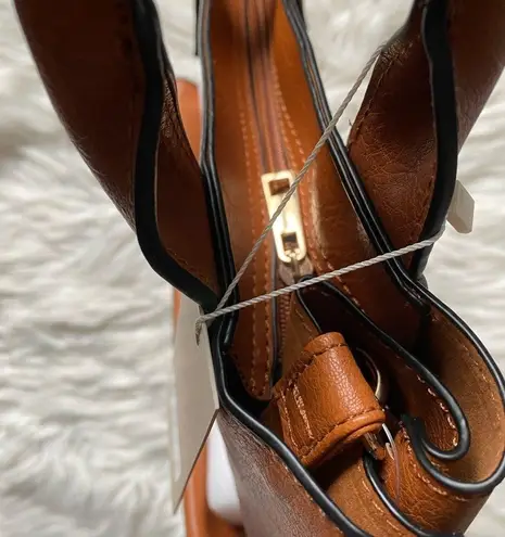 Faux leather hand bag w/ crossbody strap