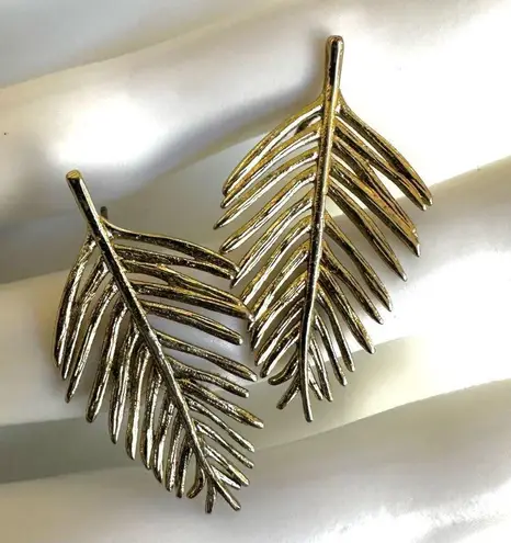 Gold tone palm leaf post earrings