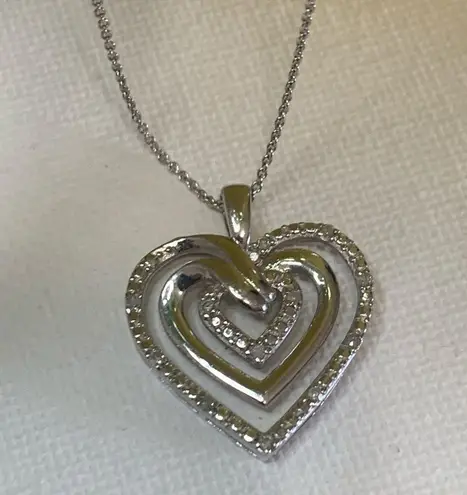 Heart shaped pendant necklace. NWT. Sterling silver. Love. Charm. Silver chain.