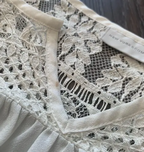 New York And Company White blouse with lace design, size small by .