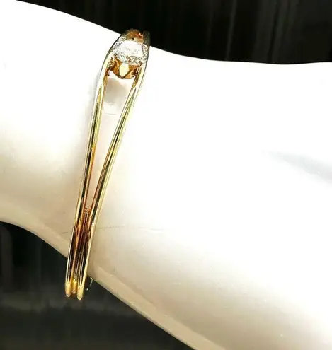 Gold tone open cuff rhinestone bracelet